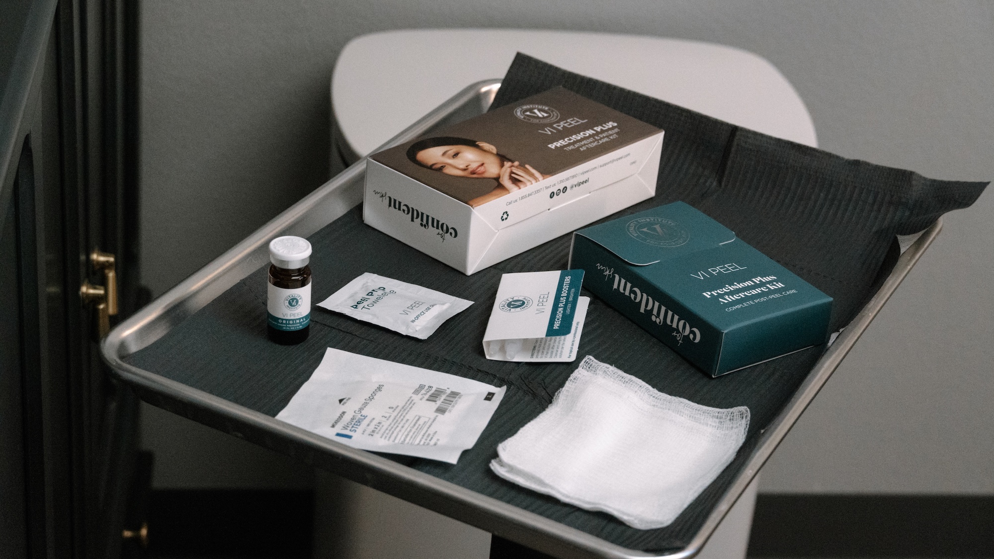 A tray holding some of the products Spry uses for melasma treatment with a chemical peel near Cedar Falls.